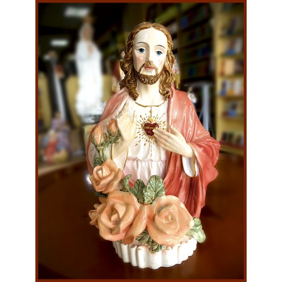 تمثال قلب يسوع مع شمعة